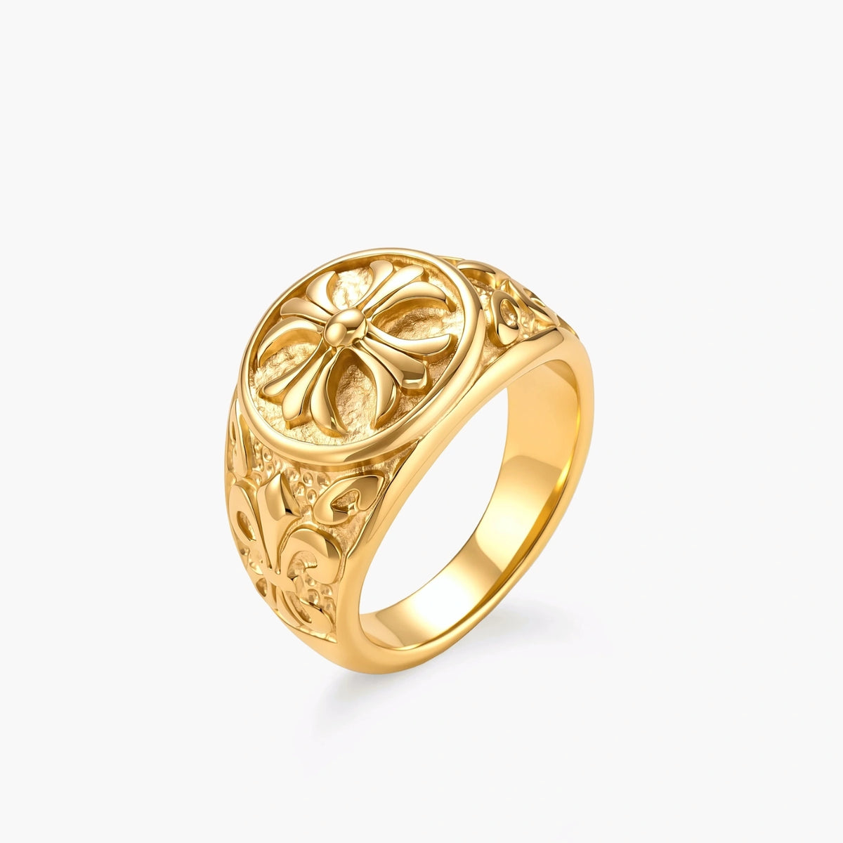 18K gold-plated stainless steel signet ring with ornate cross face and carved filigree scroll band, shown from three angles.