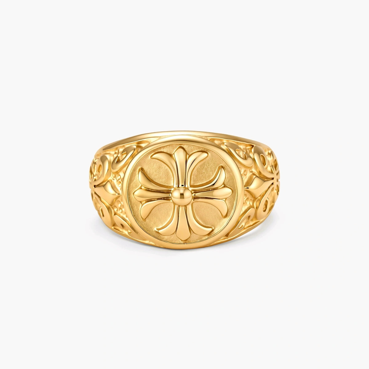 18K gold-plated stainless steel signet ring with ornate cross face and carved filigree scroll band, shown from three angles.