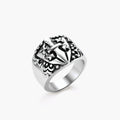 Silver 316L stainless steel men's signet ring with raised knight shield, cross motif, and ornate blackened scrollwork detailing.